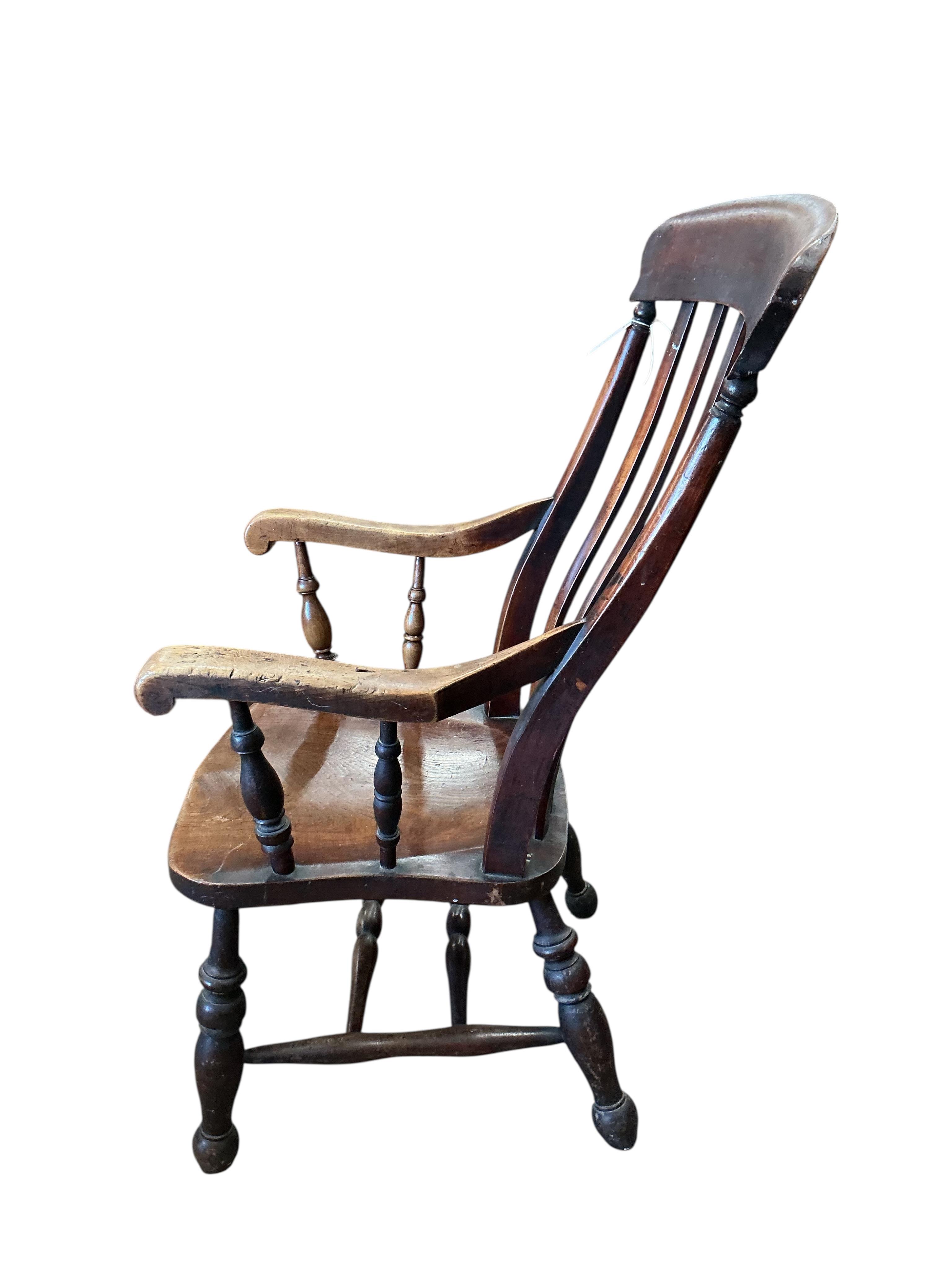 A Victorian elm and beech Windsor lathe back armchair, width 54cm, depth 52cm, height 108cm